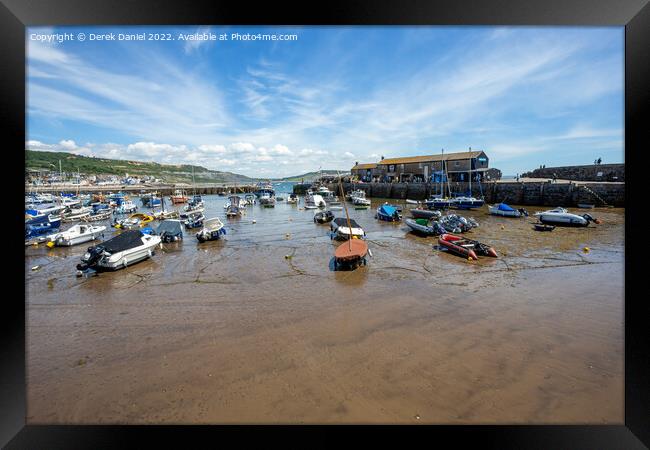 The Bustling Pearl of Dorset Framed Print by Derek Daniel