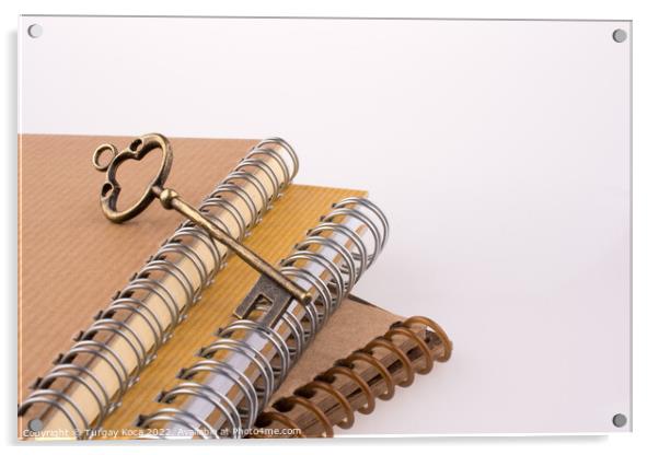 Key on notebooks Acrylic by Turgay Koca