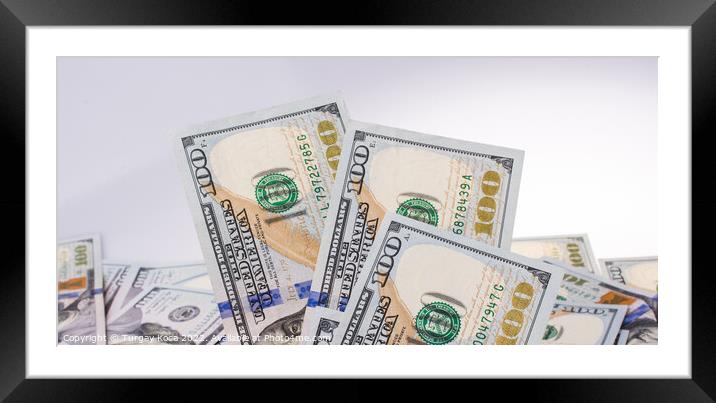 Human hand holding American dollar banknotes on wh Framed Mounted Print by Turgay Koca