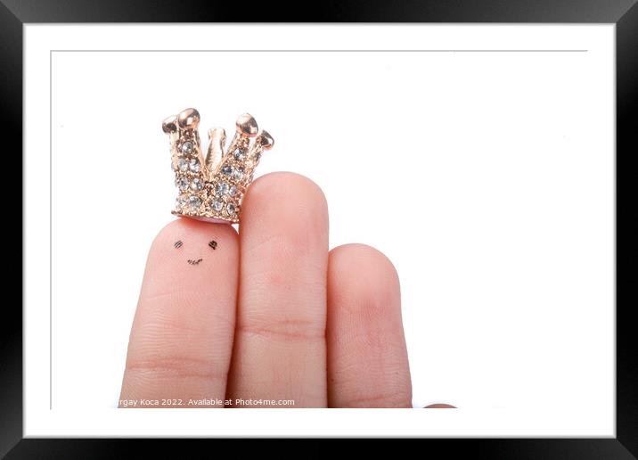 Crowned index finger Framed Mounted Print by Turgay Koca