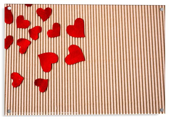 Red color paper hearts on a brown cardboard Acrylic by Turgay Koca