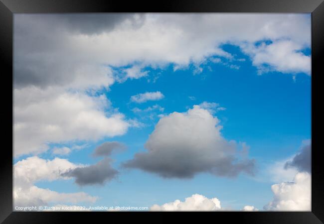 White color clouds found in the  blue sky Framed Print by Turgay Koca