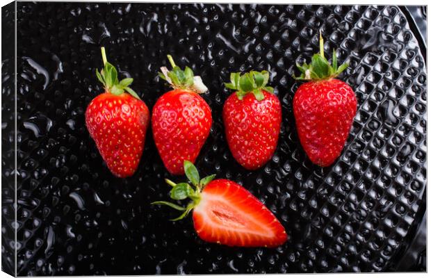 A juicy, sweet and ripe strawberry fruit Canvas Print by Turgay Koca