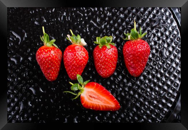 A juicy, sweet and ripe strawberry fruit Framed Print by Turgay Koca