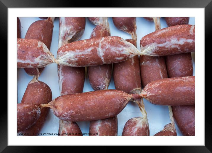 Traditional Turkish dried sausages in view Framed Mounted Print by Turgay Koca