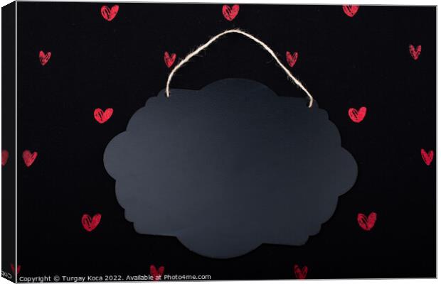 Black speech bubble shaped notice board  and red hearts Canvas Print by Turgay Koca