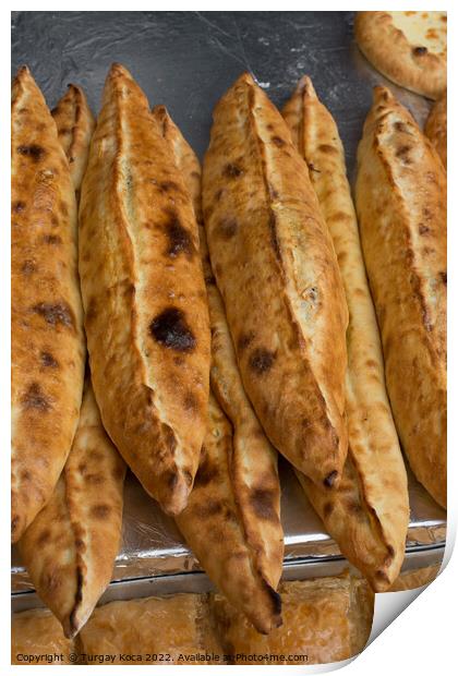 Turkish flat bread covered with cheese Print by Turgay Koca