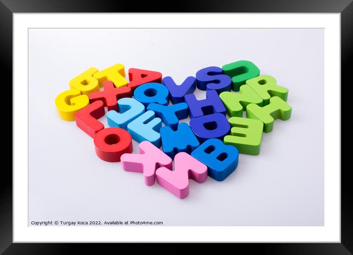 Colorful letter blocks shape heart Framed Mounted Print by Turgay Koca