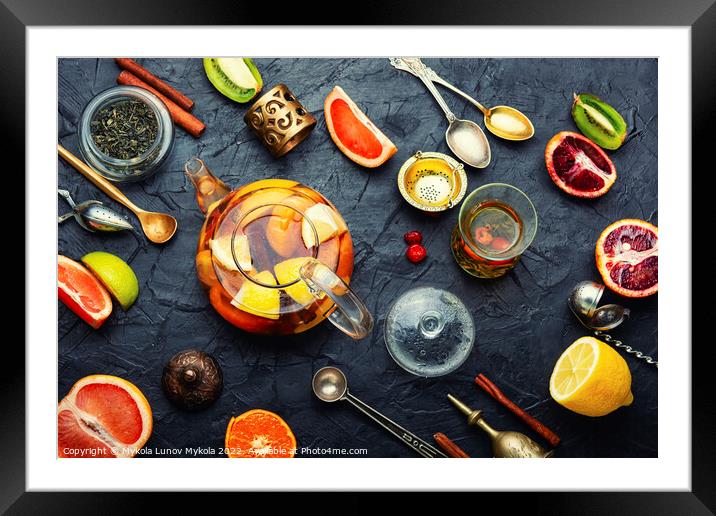 Fruit tea with citrus. Framed Mounted Print by Mykola Lunov Mykola