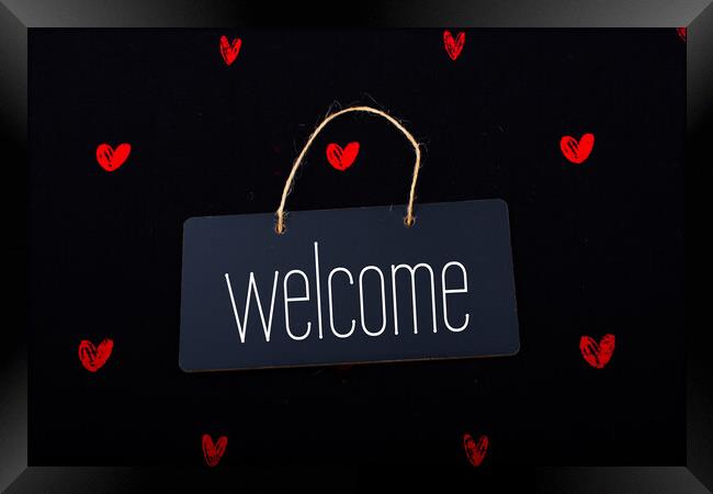 Welcome on black notice board  with red hearts around Framed Print by Turgay Koca