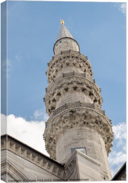 Minaret of Ottoman Mosques in view Canvas Print by Turgay Koca