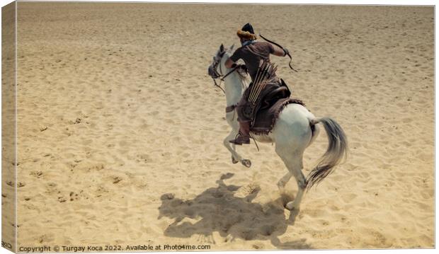 Ottoman horseman  archer riding and shooting  Canvas Print by Turgay Koca