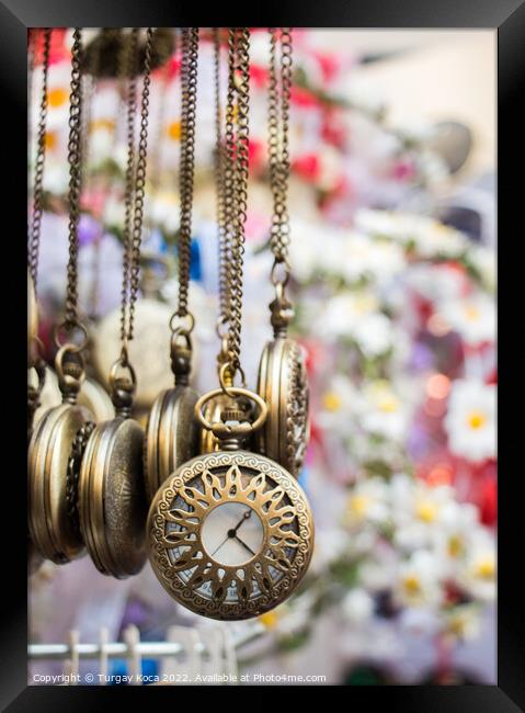 Set of pocket watches hanging Framed Print by Turgay Koca