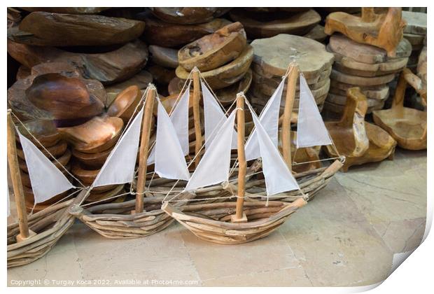 Hand made sail boats in view Print by Turgay Koca