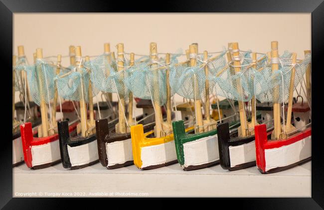 Set of little colorful model boats Framed Print by Turgay Koca