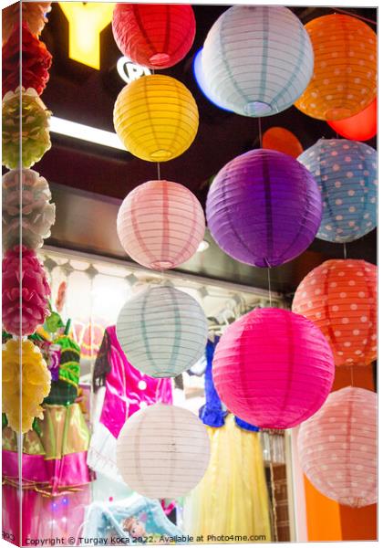 Colorful paper lantern outdoor in a marketplace Canvas Print by Turgay Koca