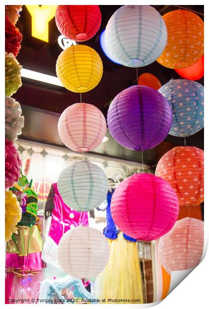 Colorful paper lantern outdoor in a marketplace Print by Turgay Koca