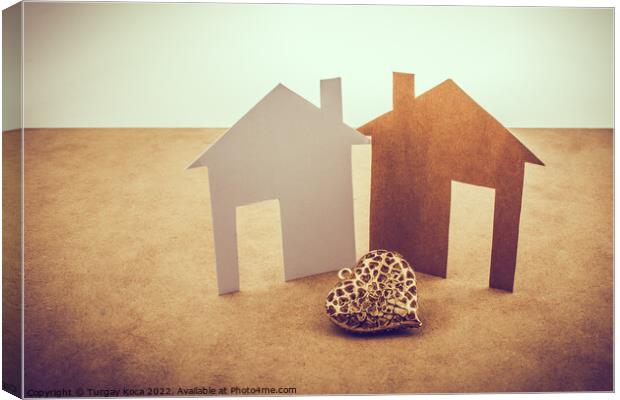 Heart shaped icon and paper houses Canvas Print by Turgay Koca