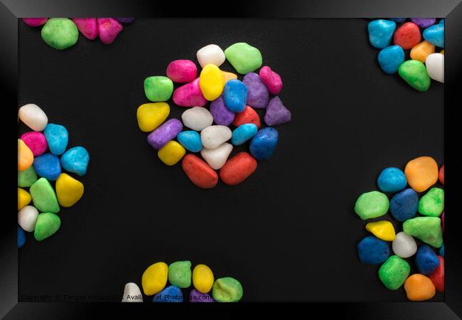 Pile of colorful pebbles as a stone background Framed Print by Turgay Koca