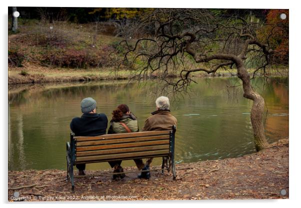 People seat on wooden bench by the lake in nature Acrylic by Turgay Koca