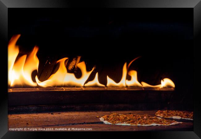 The flames beside a pancake with spicy meat filling Framed Print by Turgay Koca