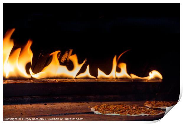 The flames beside a pancake with spicy meat filling Print by Turgay Koca