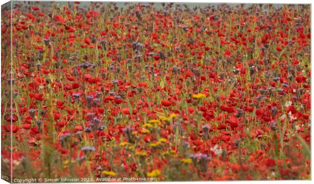 Poppies and meadow flowers Canvas Print by Simon Johnson