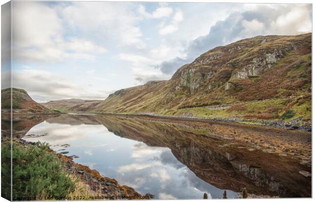 Loch Reflections on a Cloudy day  Isle of Skye  Scotland Canvas Print by Iain Gordon