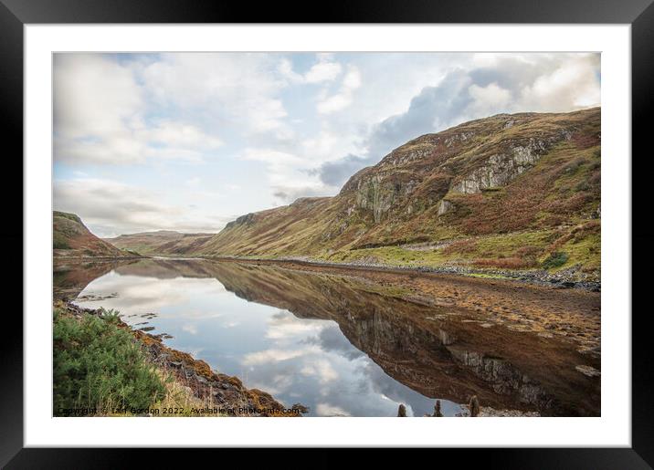 Loch Reflections on a Cloudy day  Isle of Skye  Scotland Framed Mounted Print by Iain Gordon