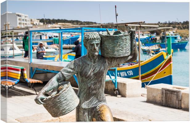 Fisherman statue in Marsaxlokk Canvas Print by Jason Wells