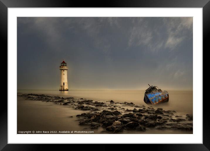 wreck at perch rock lighthouse Framed Mounted Print by John Race
