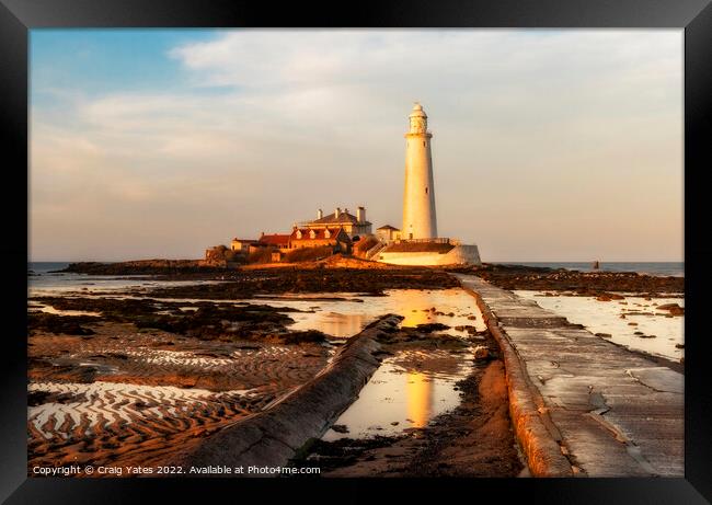 A Serene Moment at St Marys Lighthouse Framed Print by Craig Yates