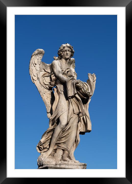 Angel with the Garment and Dice Statue Framed Mounted Print by Artur Bogacki