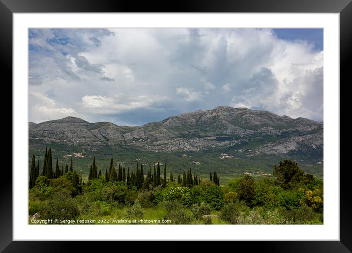Mountain landscape with dramatic sky. A storm is coming from the mountains. Framed Mounted Print by Sergey Fedoskin
