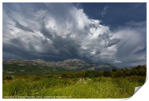 Mountain landscape with dramatic sky. A storm is coming from the mountains. Print by Sergey Fedoskin