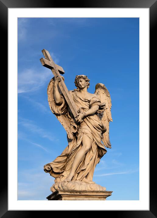 Angel Carrying the Cross Statue Framed Mounted Print by Artur Bogacki