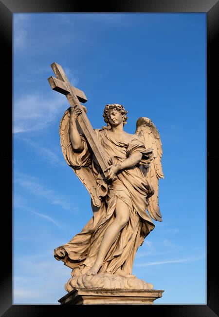 Angel Carrying the Cross Statue Framed Print by Artur Bogacki