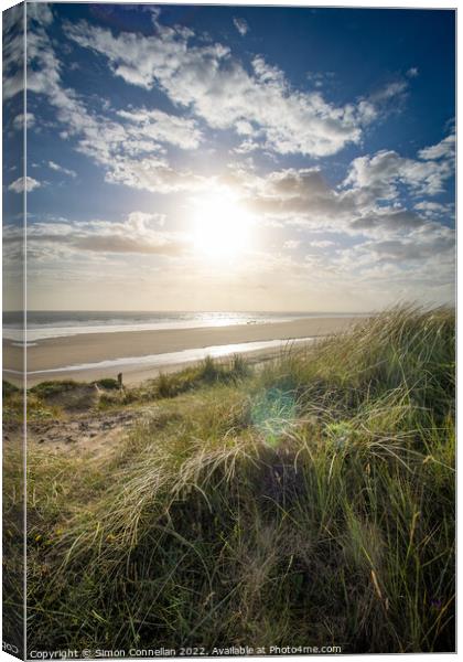Sunset on Kenfig Nature Reserve Canvas Print by Simon Connellan