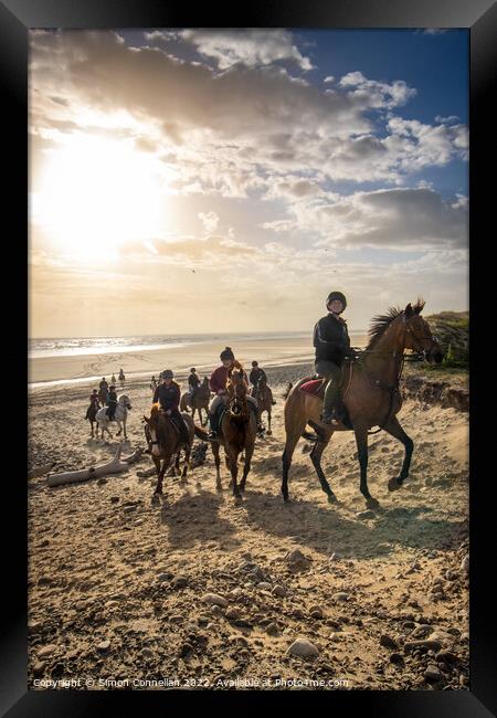 Beach Horse Riders  Framed Print by Simon Connellan