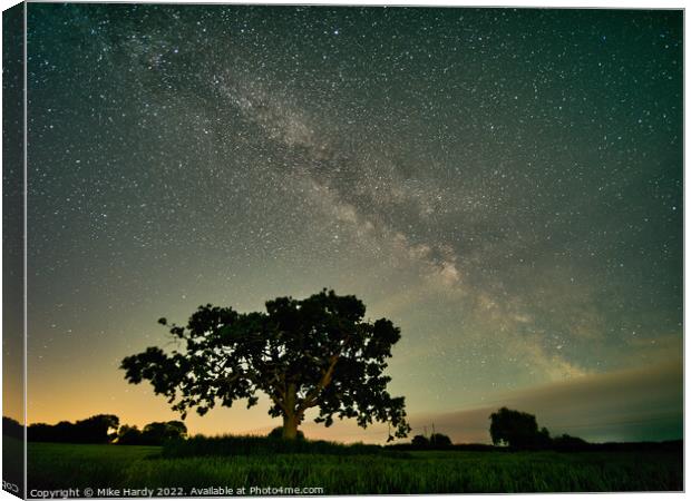 Dawn chases away the Milky Way Canvas Print by Mike Hardy
