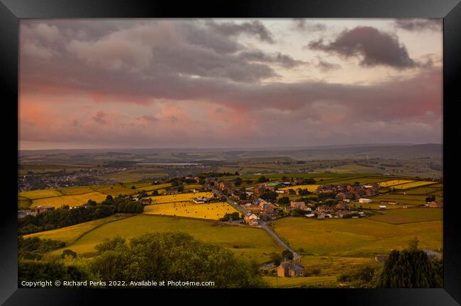 Storm clouds and sunshine over Golcar and Slaithwa Framed Print by Richard Perks
