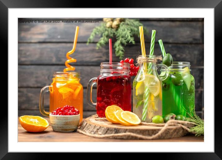 organic fresh juices in bottles served with straws Framed Mounted Print by Stan Lihai