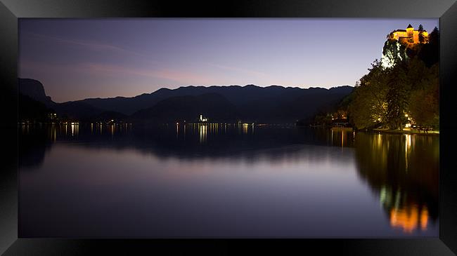 View across Lake Bled at dusk Framed Print by Ian Middleton