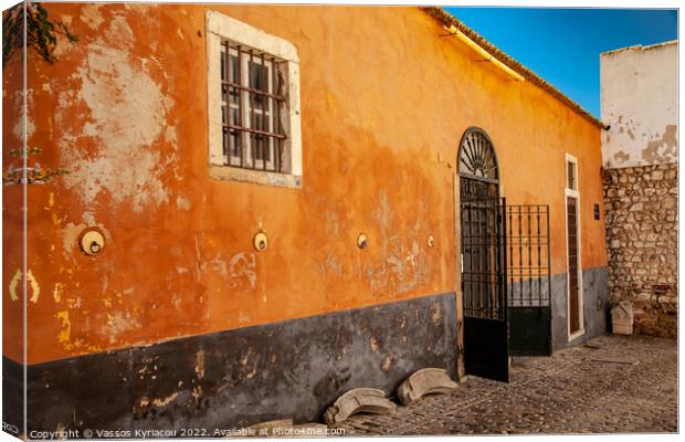Colourful old building with wrought iron gate in F Canvas Print by Vassos Kyriacou