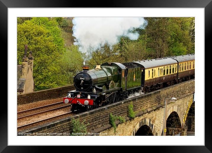 Majestic steam engine powers through West Yorkshir Framed Mounted Print by Rodney Hutchinson