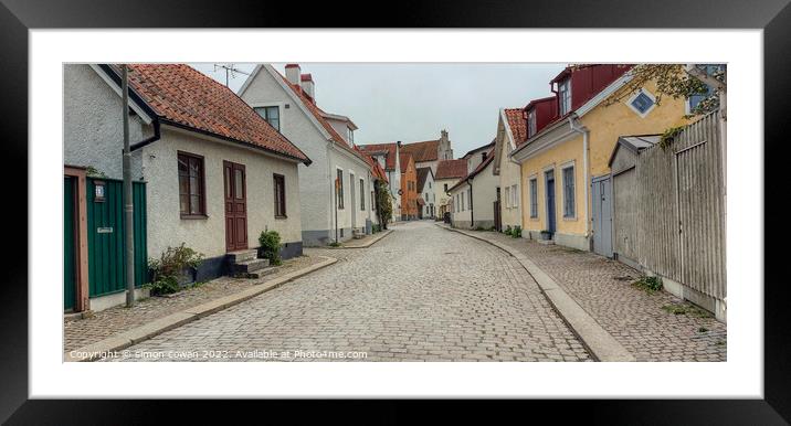 Lovely street @ Visby Sweden Framed Mounted Print by simon cowan
