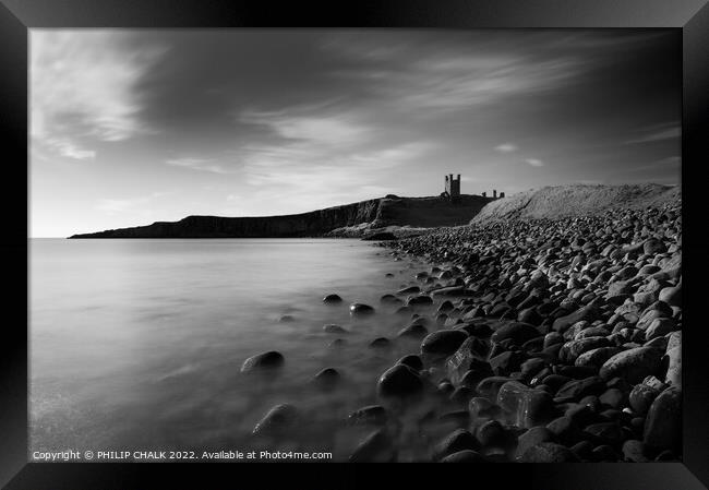 Dunstanburgh castle on the Northumberland coast black and white 734 Framed Print by PHILIP CHALK