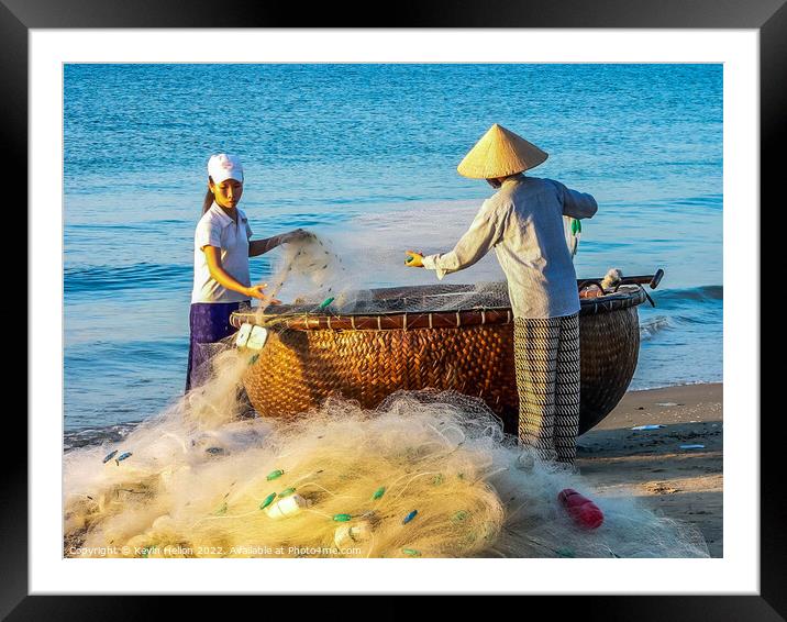 Folding the nets, Mui Ne, Vietnam Framed Mounted Print by Kevin Hellon