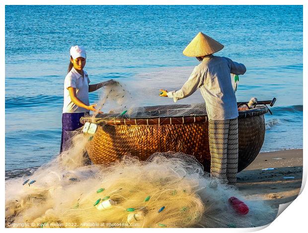 Folding the nets, Mui Ne, Vietnam Print by Kevin Hellon