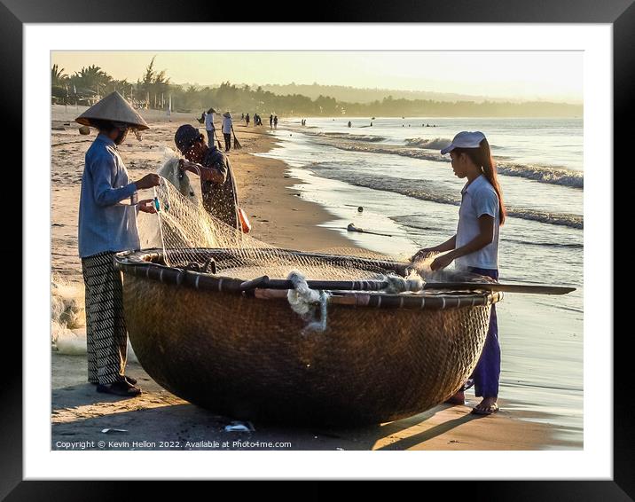 Folding the nets, Mui Ne, Vietnam Framed Mounted Print by Kevin Hellon